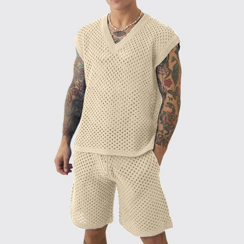 Man wearing a blue V-neck knitted vest and matching shorts from a cotton polyester sports suit set.
