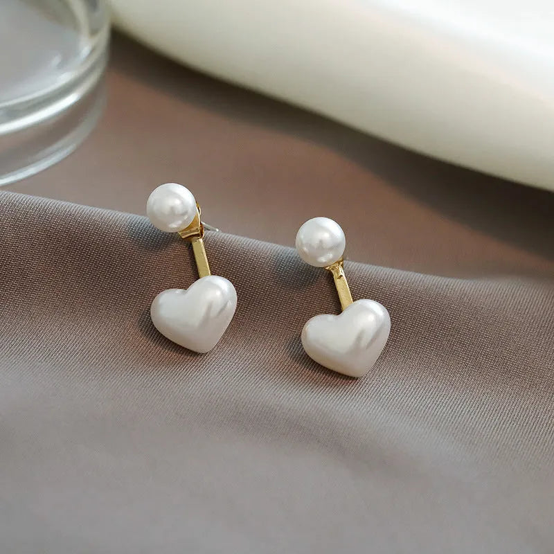 Korean style women's heart-shaped pearl stud earrings with alloy construction and electroplated silver tone finish