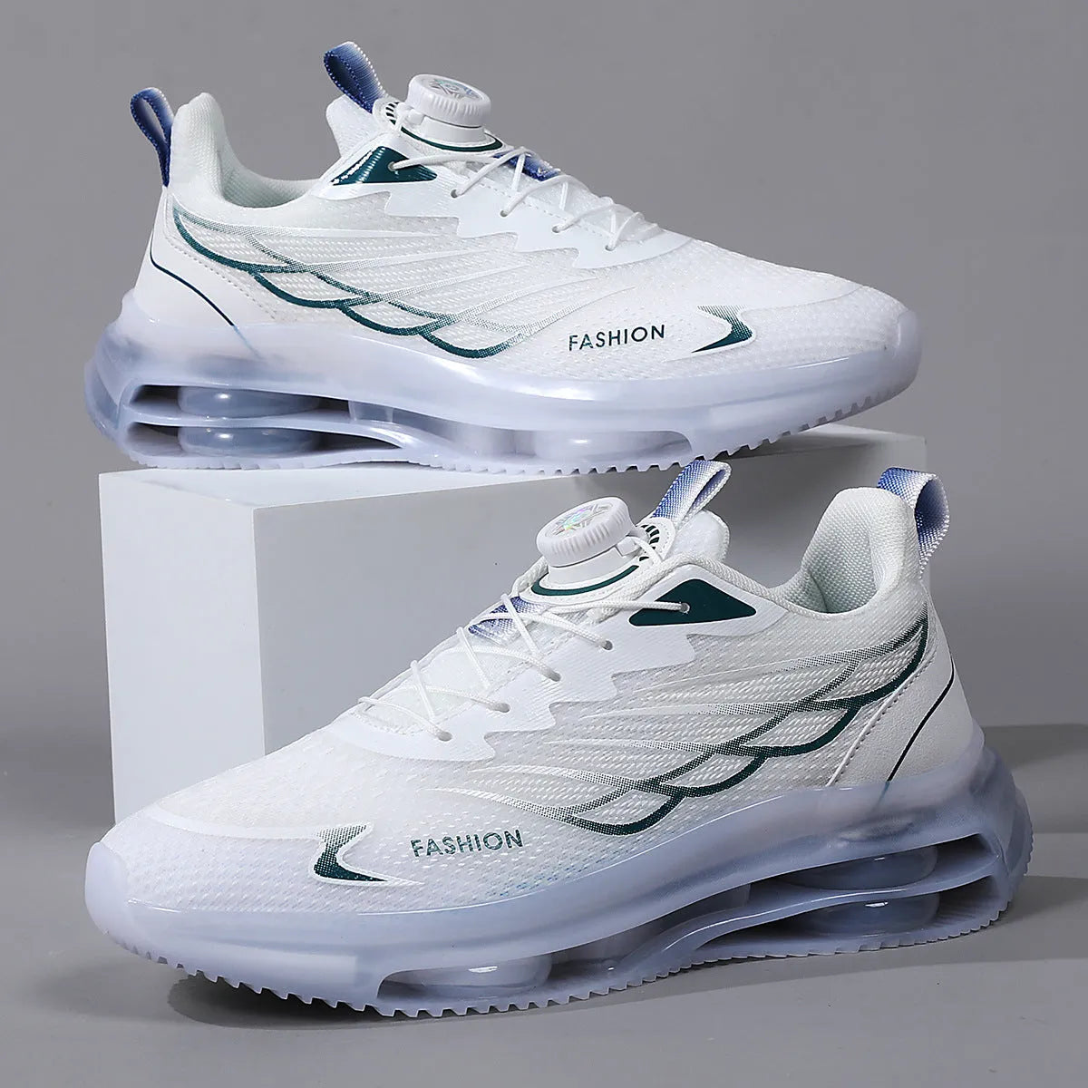 White youth sports casual shoes with rotating button and lace-up closure, mesh upper, and rubber sole.