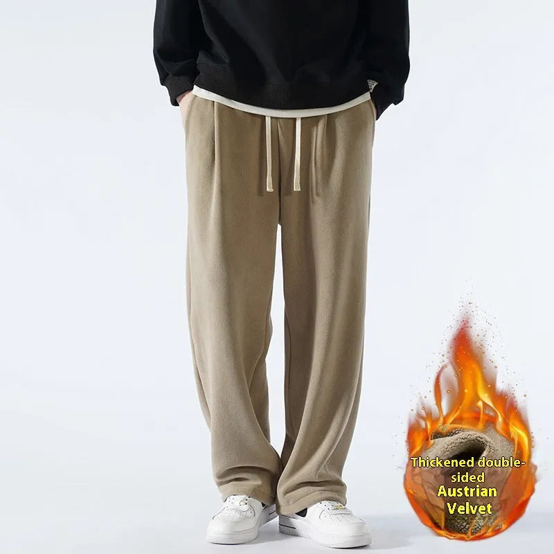 Men's apricot coloured fleece-lined loose fit sports trousers with an elasticated drawstring waist.