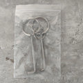 Two alloy wrench tools from portable maintenance set on plain background