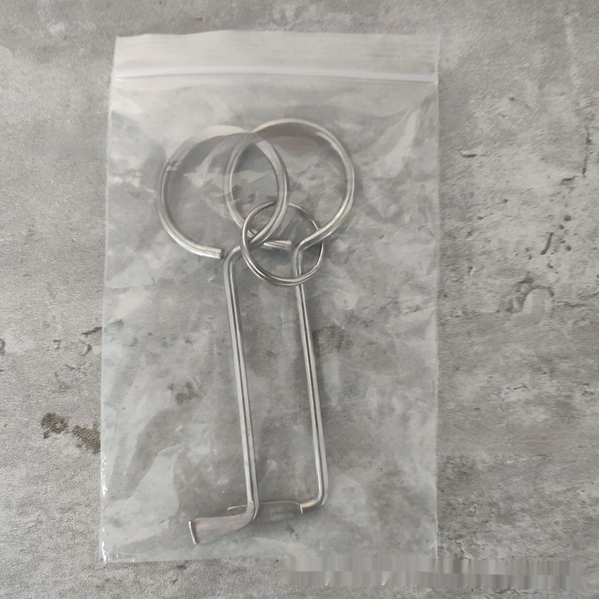 Two alloy wrench tools from portable maintenance set on plain background