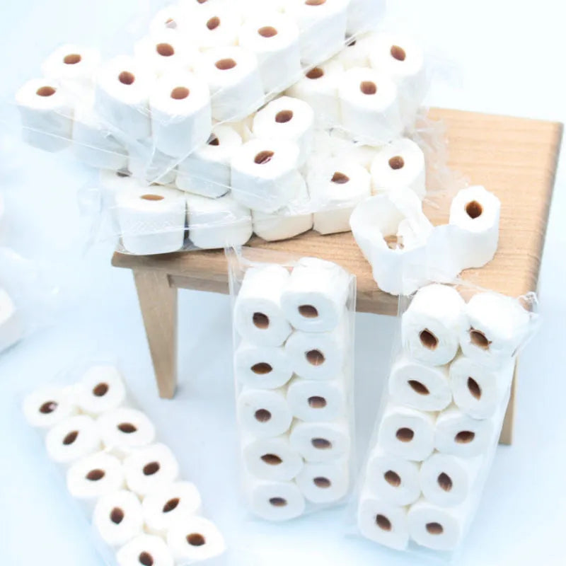 Small paper replica of a toilet paper roll toy for children, measuring 30mm by 15mm by 80mm.