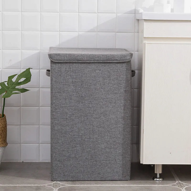 Foldable cotton-linen storage basket in grey colour showing three-dimensional construction