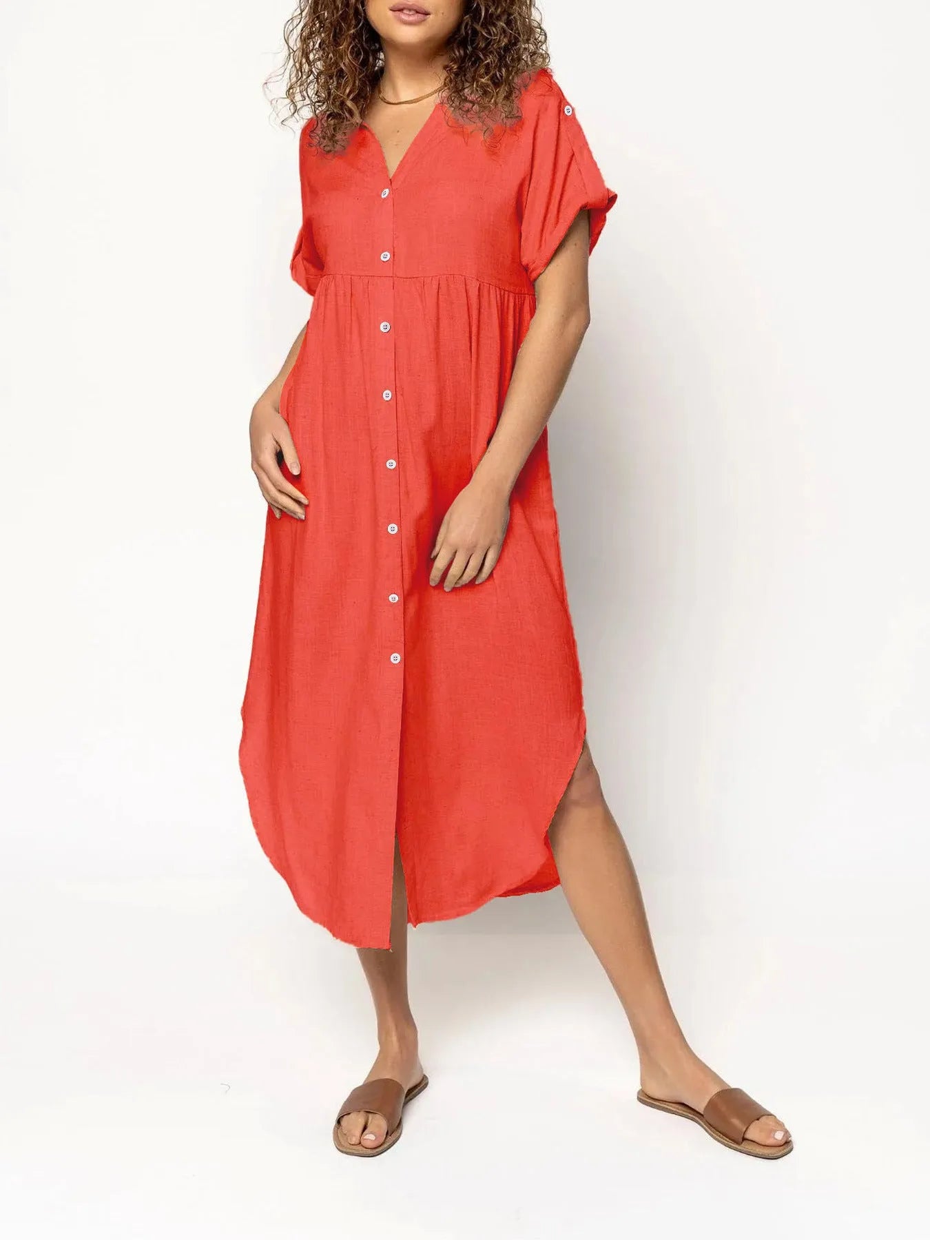Casual mid-length button-front dress in solid colour with regular sleeves and mid-waist cut