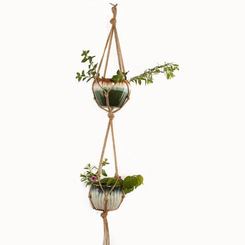 Woven wire plant basket with cotton rope, shown as a desktop planter and wall hanging style.