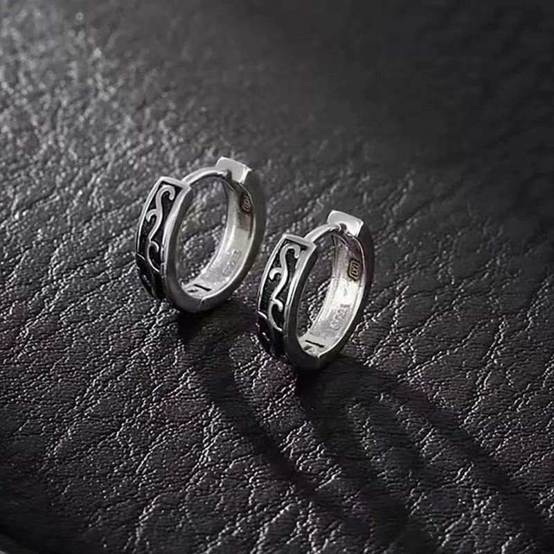 Men's silver geometric hoop earrings in 10mm and 14mm sizes on a plain background.