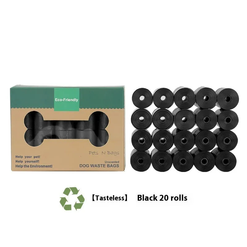 Roll of green EPI degradable dog poop bags next to a white dispenser on a table.