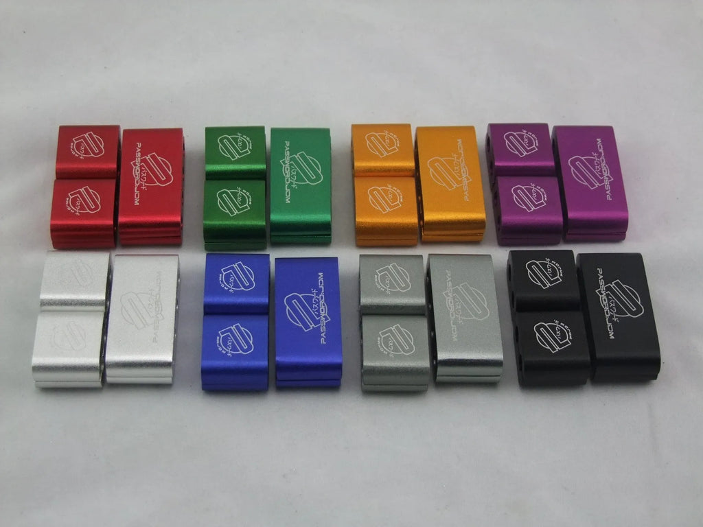 Three-piece metal car modification fastening clamp in assorted colours on a white background