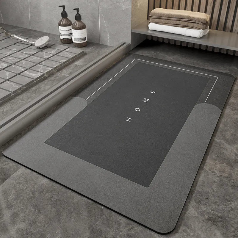 Blended fabric bathroom floor mat in blue colour, rectangular shape, on a tiled floor.