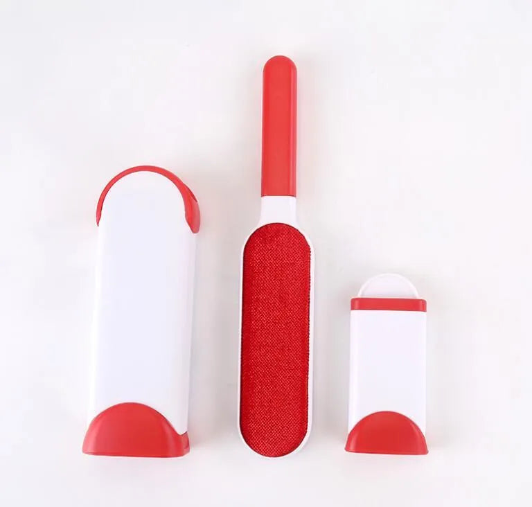 Blue reusable pet hair removal comb with a large double-sided sticky brush and a self-cleaning base unit.