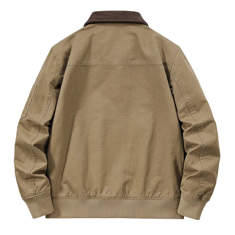 Men's washed cotton baseball-style flight jacket in beige, shown in a casual setting.