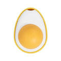 Interactive catnip ball toy with adhesive backing for walls, available in fried egg and poached egg designs