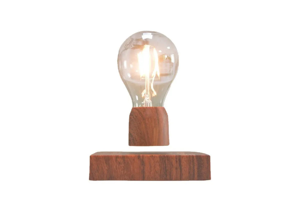 Magnetic levitation floating light bulb with imitation wood base and glass enclosure