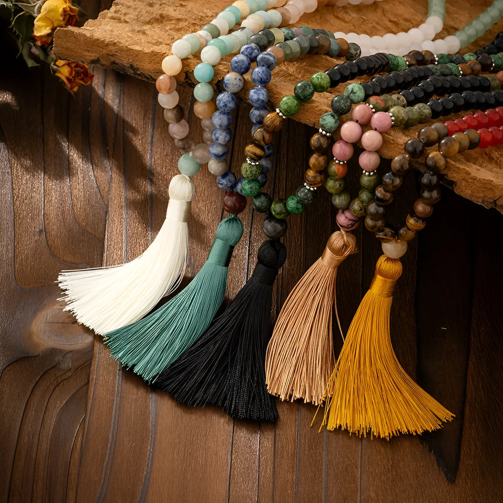 Vintage bohemian style beaded sweater chain with geometric beads and tassel pendant, shown with matching bracelet