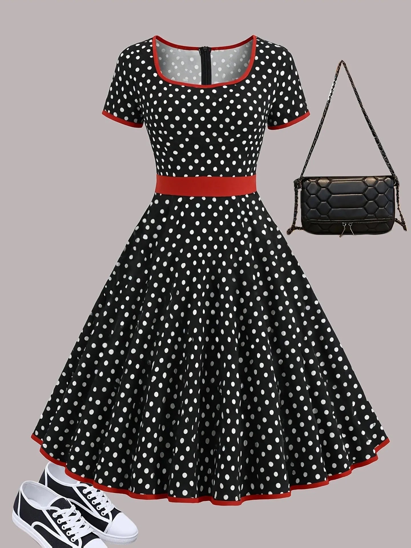 Women's multicolour polka dot dress with square collar, short sleeves, front zipper, and pleated A-line skirt.