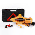 Electric hydraulic car jack kit with 2 tonne lifting capacity mounted in a vehicle boot.