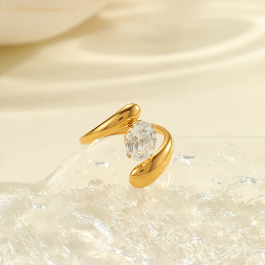 Geometric zircon ring with stainless steel construction and open mouth design in electroplated finish