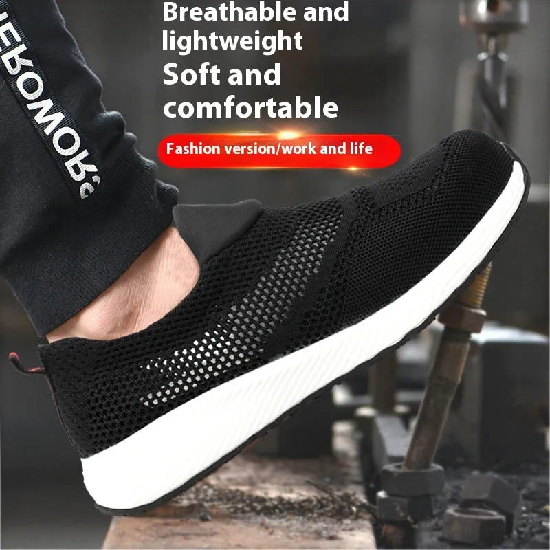 Men's lightweight black mesh steel toe safety work shoe on a grey background