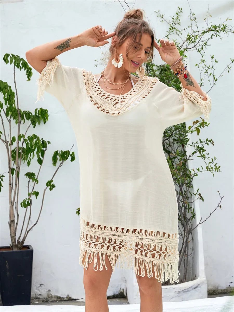 Apricot-coloured hand-crocheted beach dress for women, shown on a model.