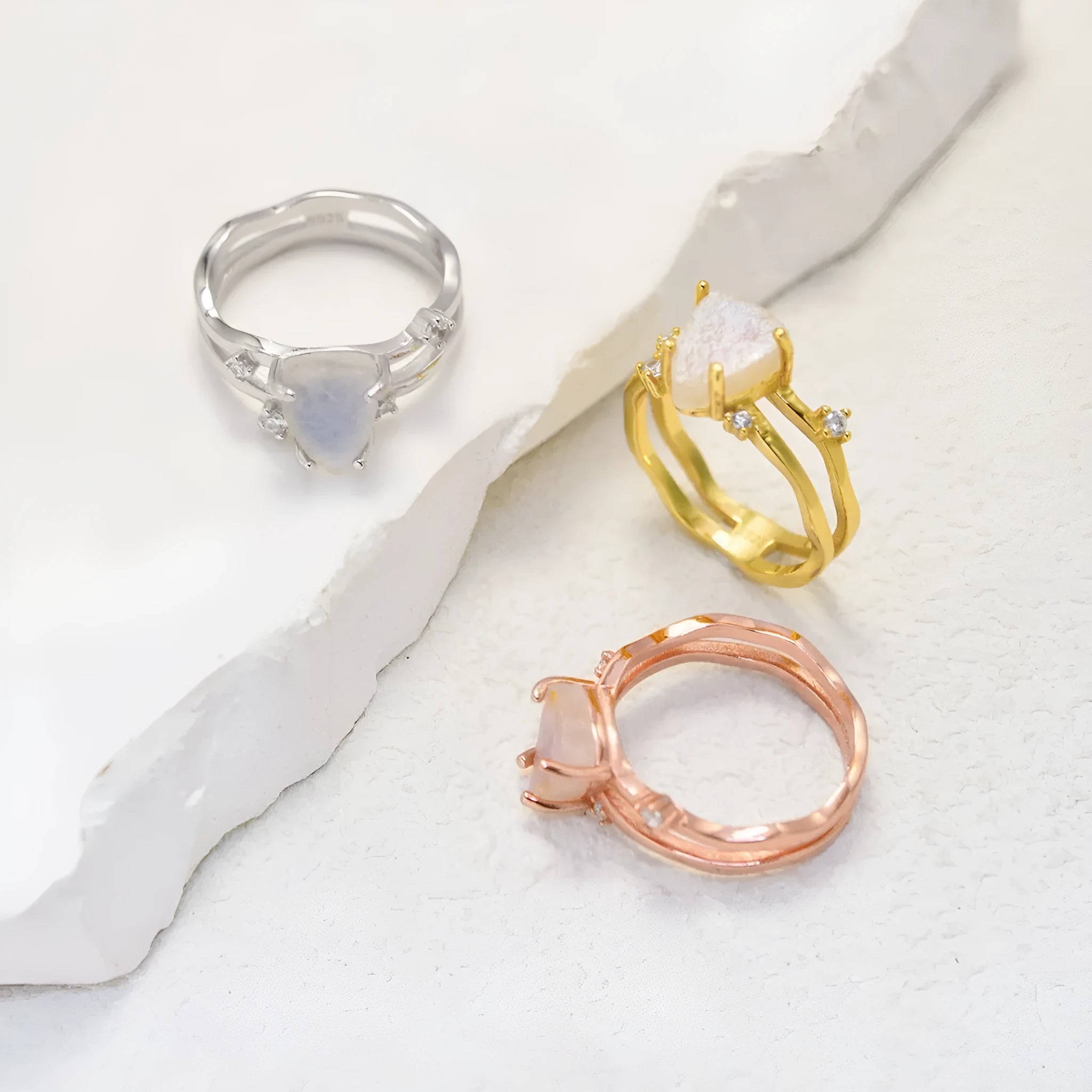 S925 sterling silver irregular triangle ring with a moonstone in rose gold, white gold, or yellow gold finish.