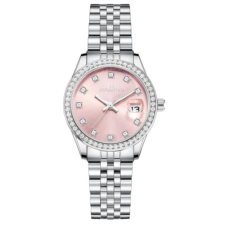 Women's silver alloy quartz fashion watch with circular dial and stainless steel buckle on wrist