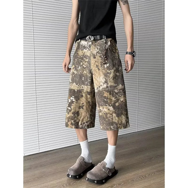 Yellow cotton denim cropped jeans with a snake camouflage pattern print.