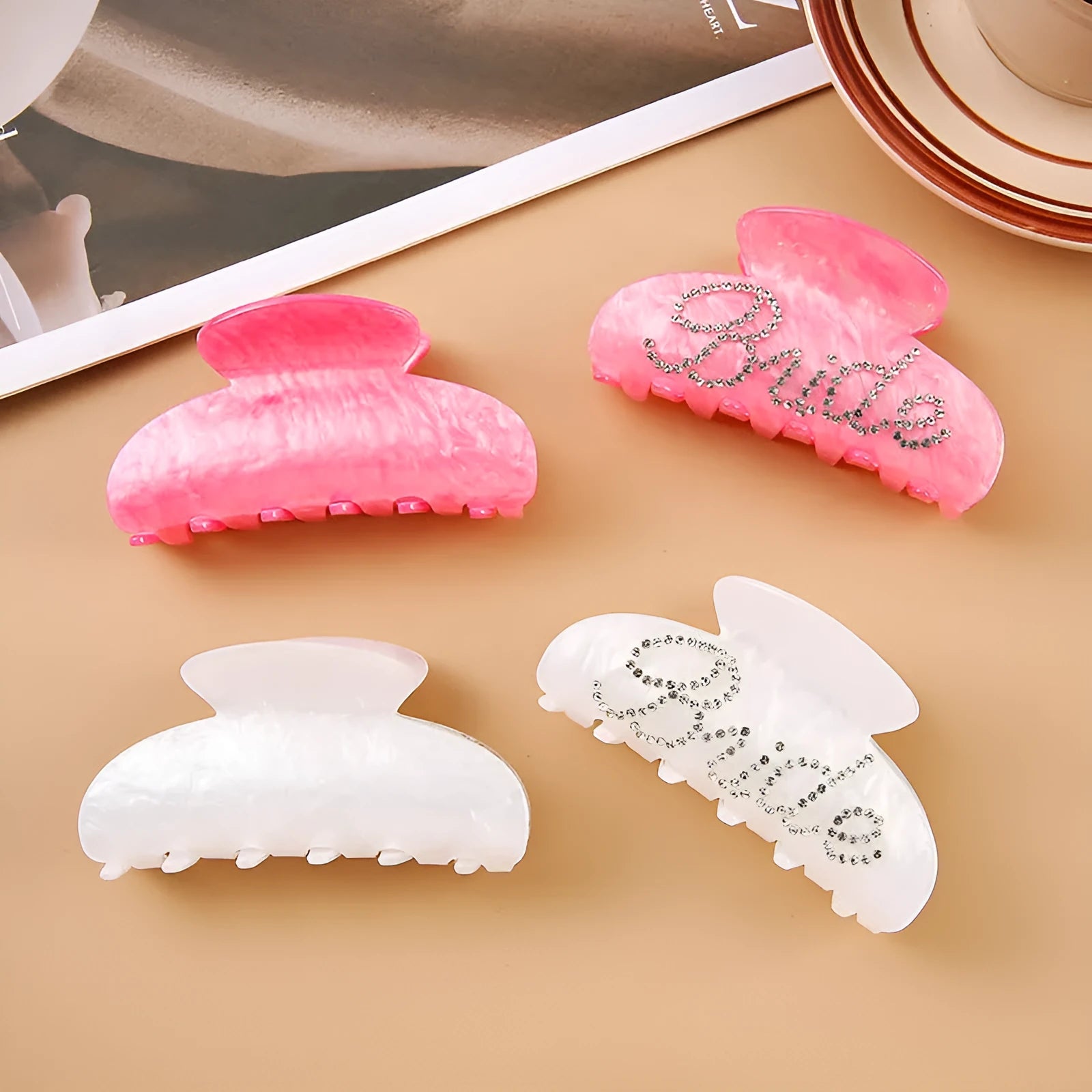 Pink acrylic hair clip with shark shape and diamond spot drilling, 10cm long with spring-clip back.