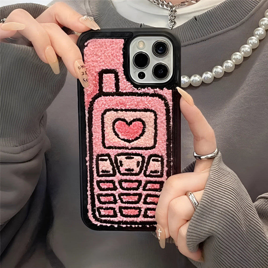 Pink TPU iPhone case with a raised towel embroidery texture on the back.