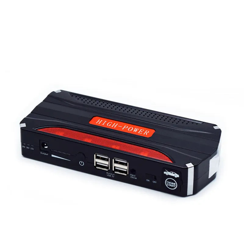Black and red 12V vehicle emergency jump starter power supply unit on a white background.