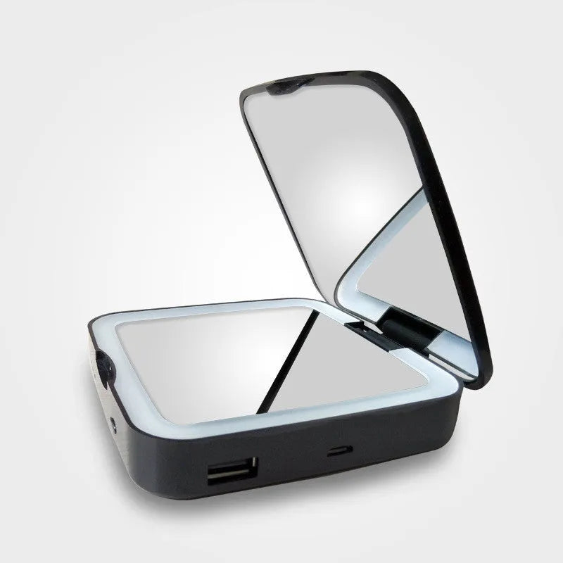 Black and white LED makeup mirror with dual surfaces including 4x magnification and adjustable lighting