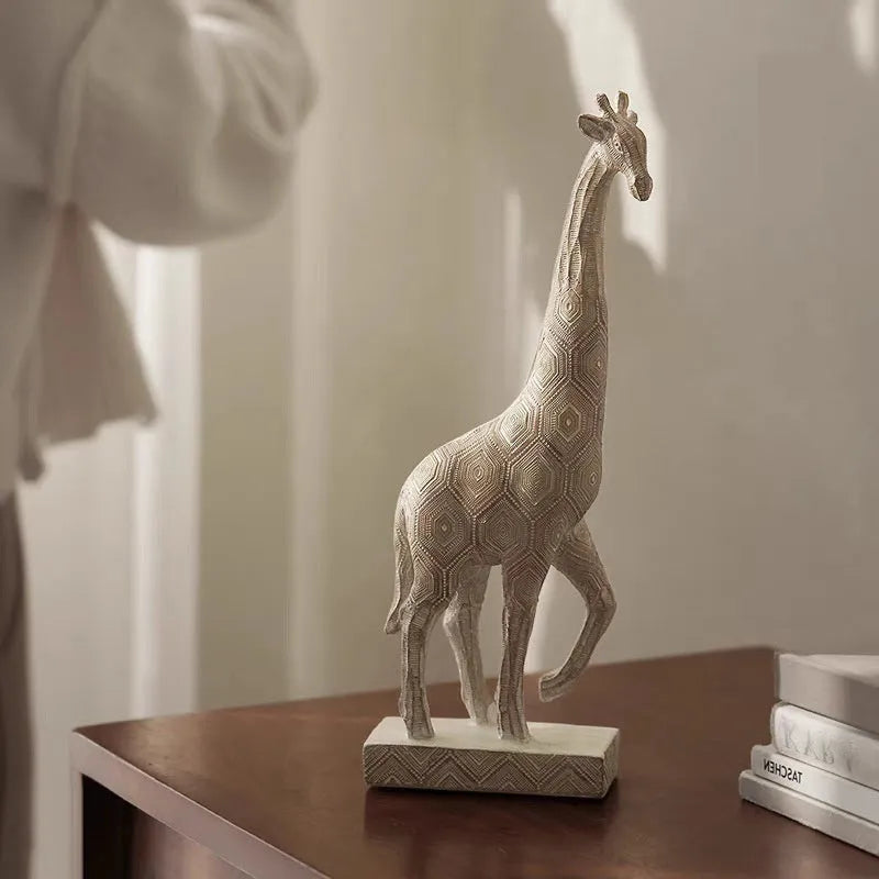 Wood colour synthetic resin giraffe sculpture ornament, 30.5 cm tall.