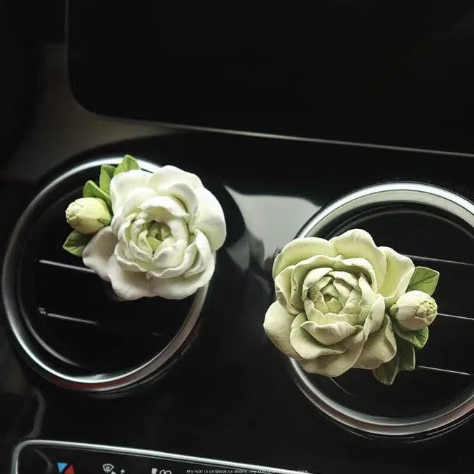 Solid jasmine car air freshener with gypsum construction for vehicle vents