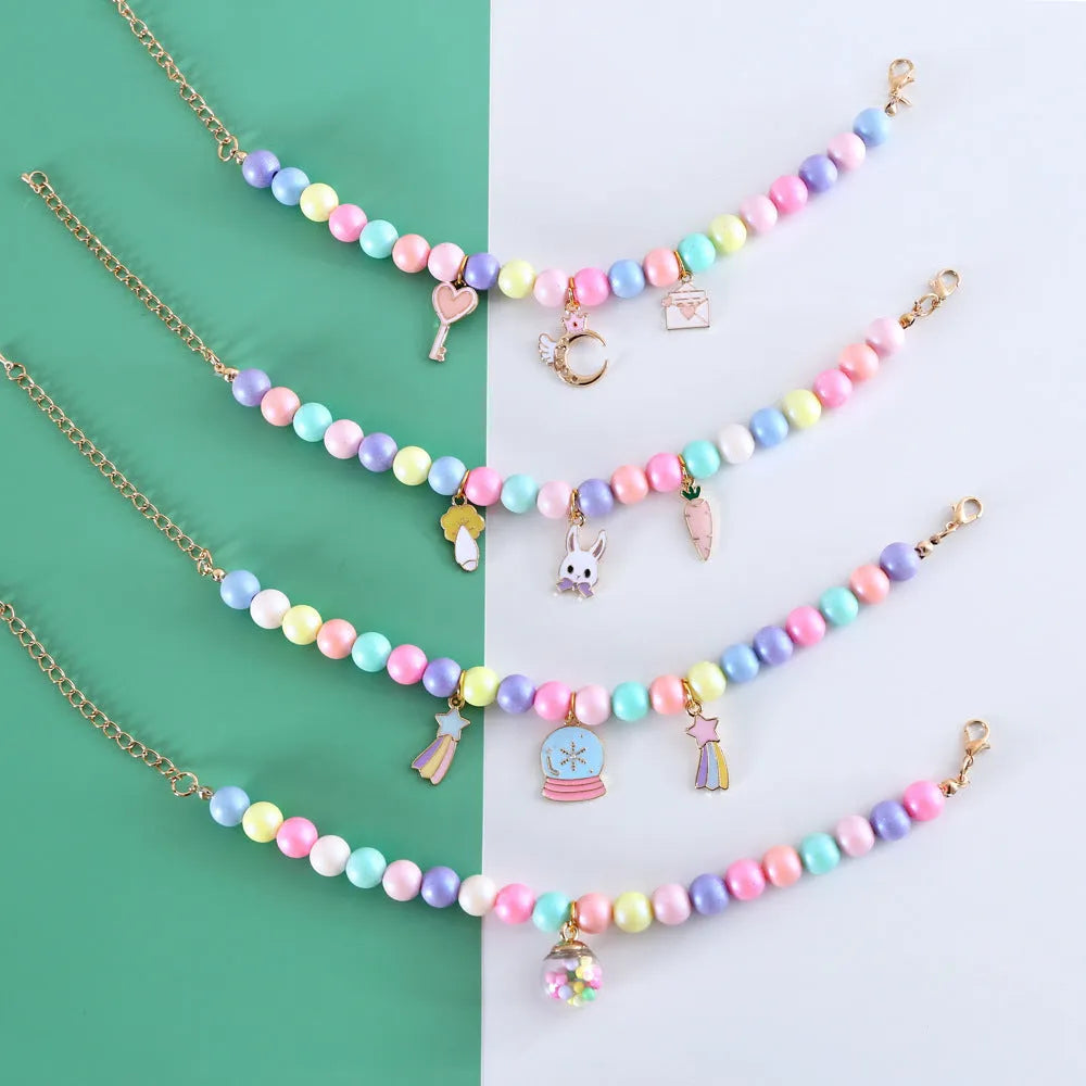 Macaron-coloured pet accessory set with resin headdress, collar, necklace and bracelet for photography