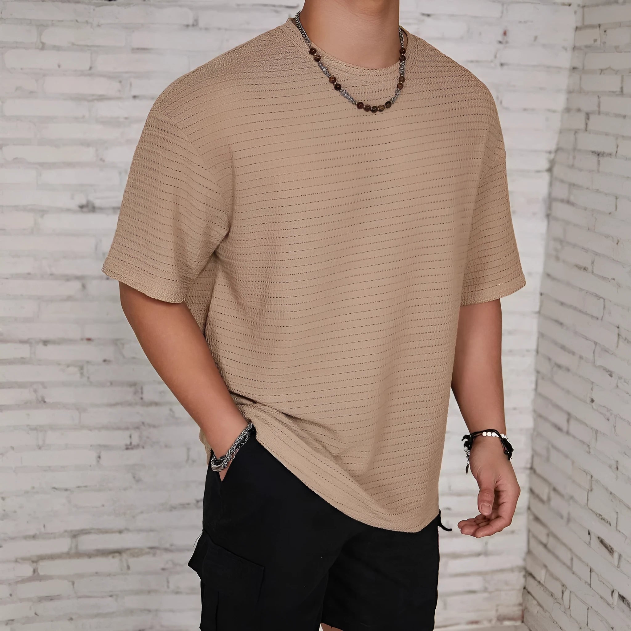 Men's slim fit loose hollow knit t-shirt in polyester available in black, white, light blue and khaki colours