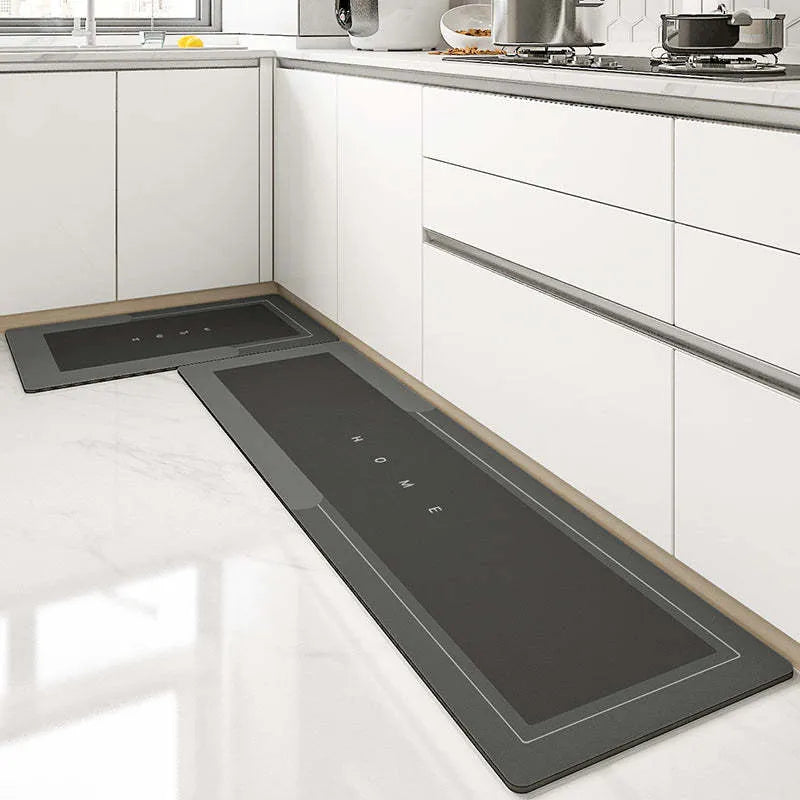 Blended fabric bathroom floor mat in blue colour, rectangular shape, on a tiled floor.
