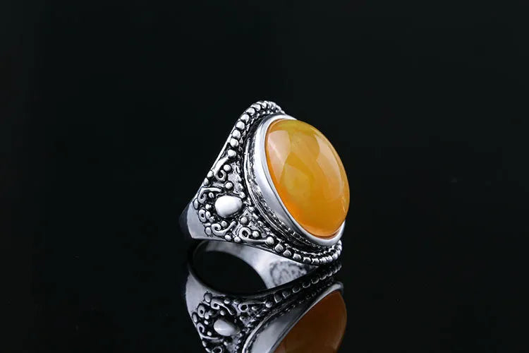 Alloy geometric retro ring with antique silver amber colour and fluorescent beeswax detailing