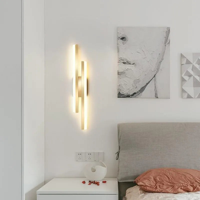 Modern minimalist LED wall light with acrylic shade in black or gold finish showing 50cm and 65cm size options