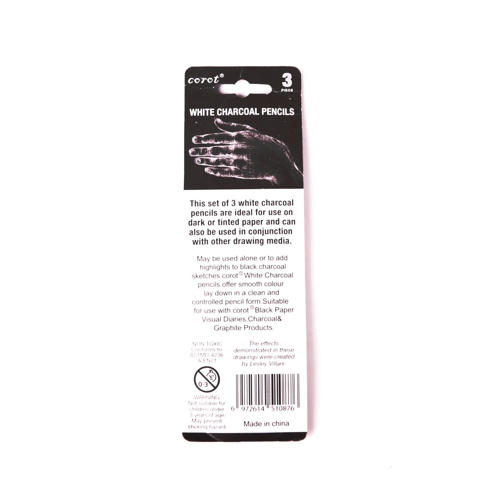 Set of three white charcoal pencils with wooden shells for highlighting and shading art on dark paper