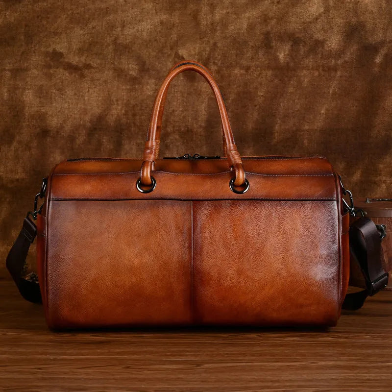 Retro leather travel bag handmade from first layer cowhide with 20L capacity