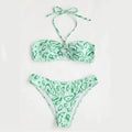 Women's floral bandeau bikini swimsuit in blue with split hipster design