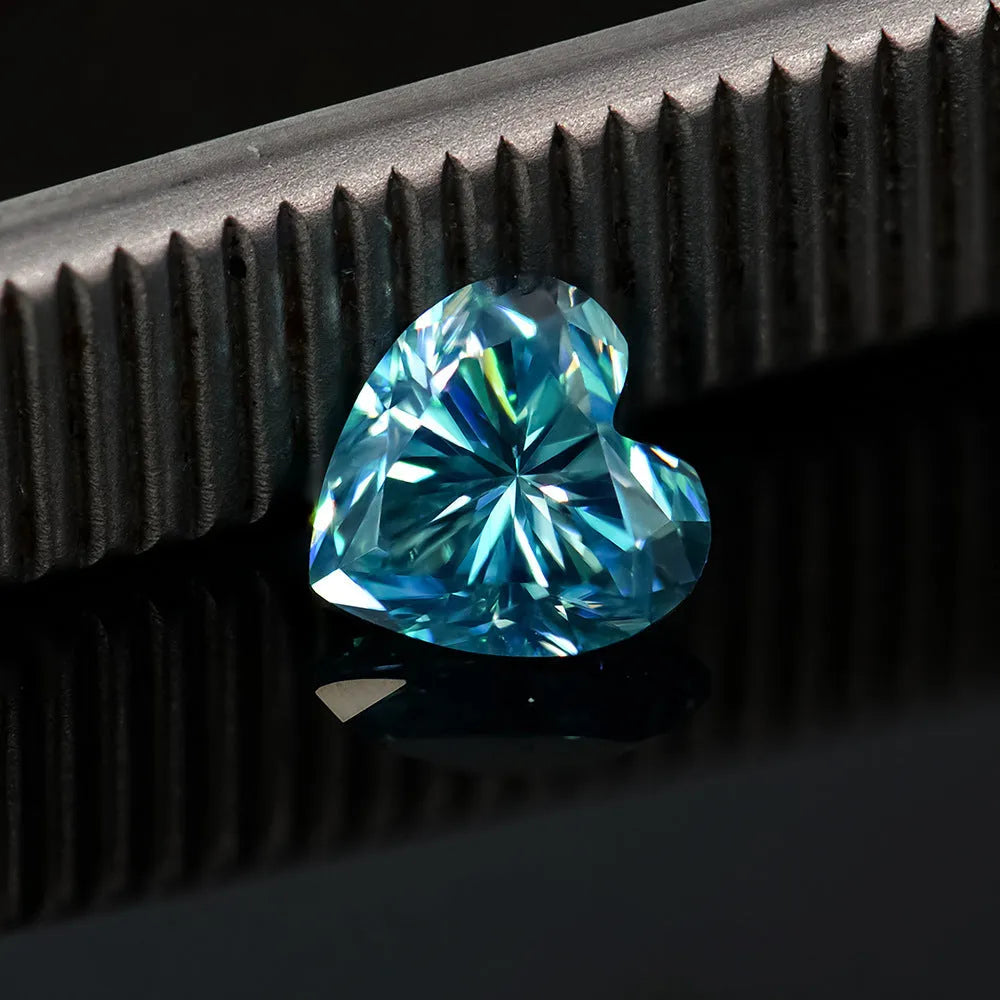 A loose lemon yellow heart-shaped moissanite stone shown at 5x5mm size for jewellery making.