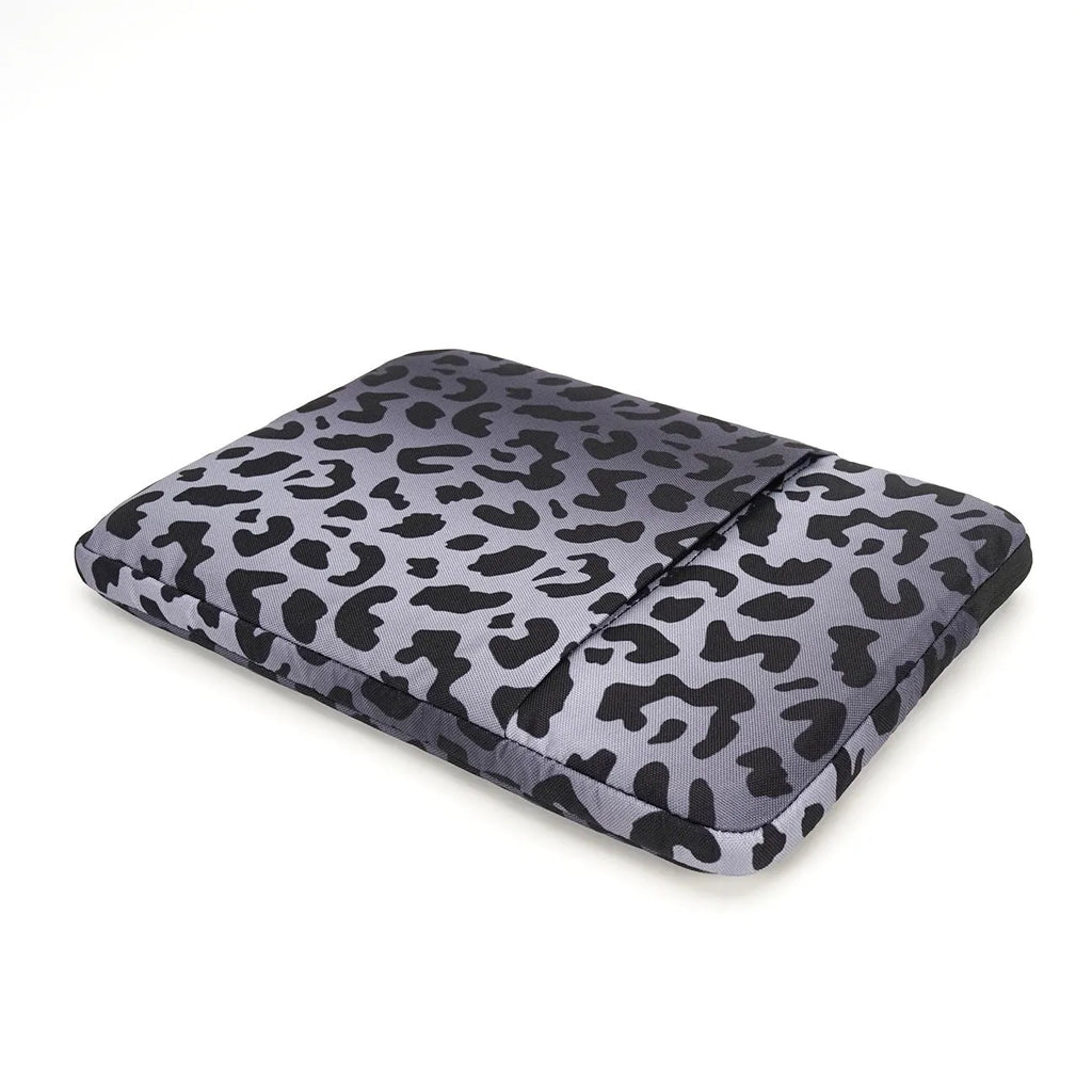 Leopard print laptop sleeve for 13-inch to 16-inch laptops with waterproof polyester and anti-shock protection