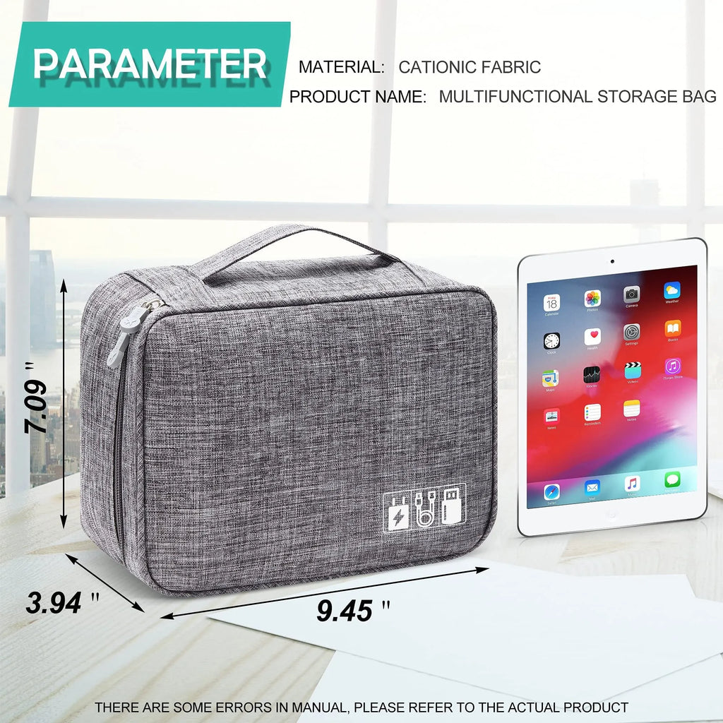 Black travel cable organiser bag open to show mesh pockets, elastic loops, and removable padded dividers inside.