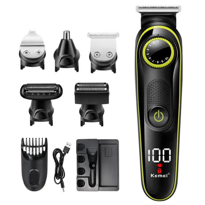 Black KM-696 USB rechargeable electric hair clipper set with stainless steel blades and cleaning brush.