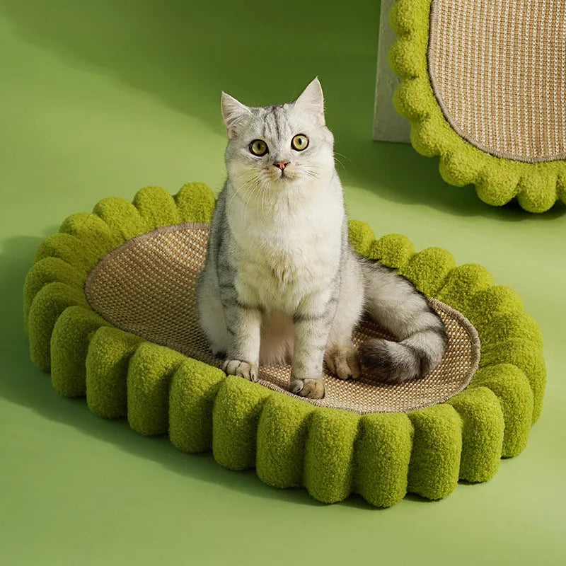 Green oval cat scratch pad bowl with sisal scratching surface measuring 650x420mm