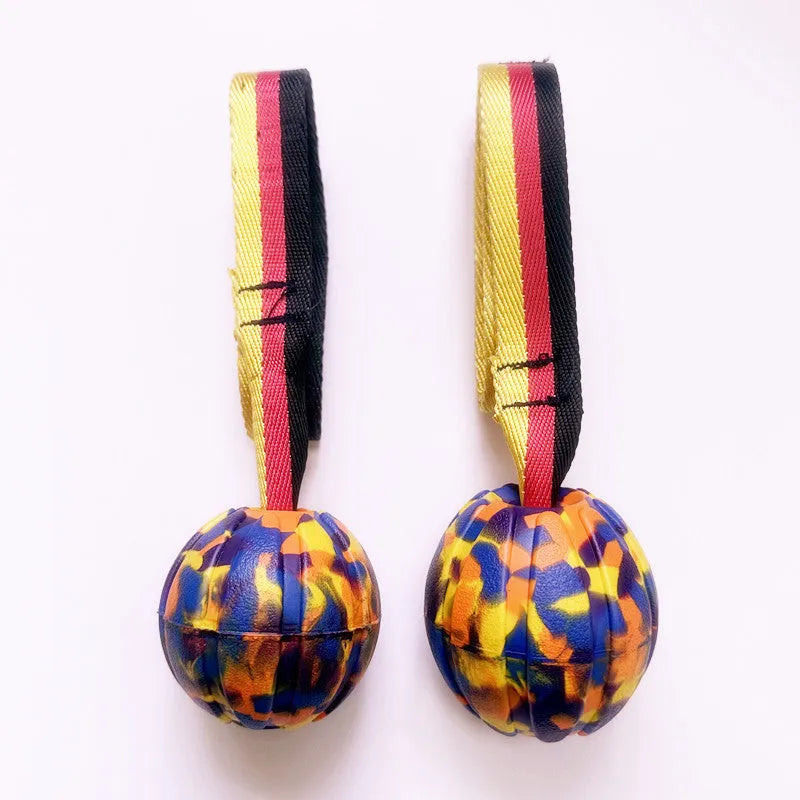 Floating EVA dog training tether ball in camouflage colour with attached string