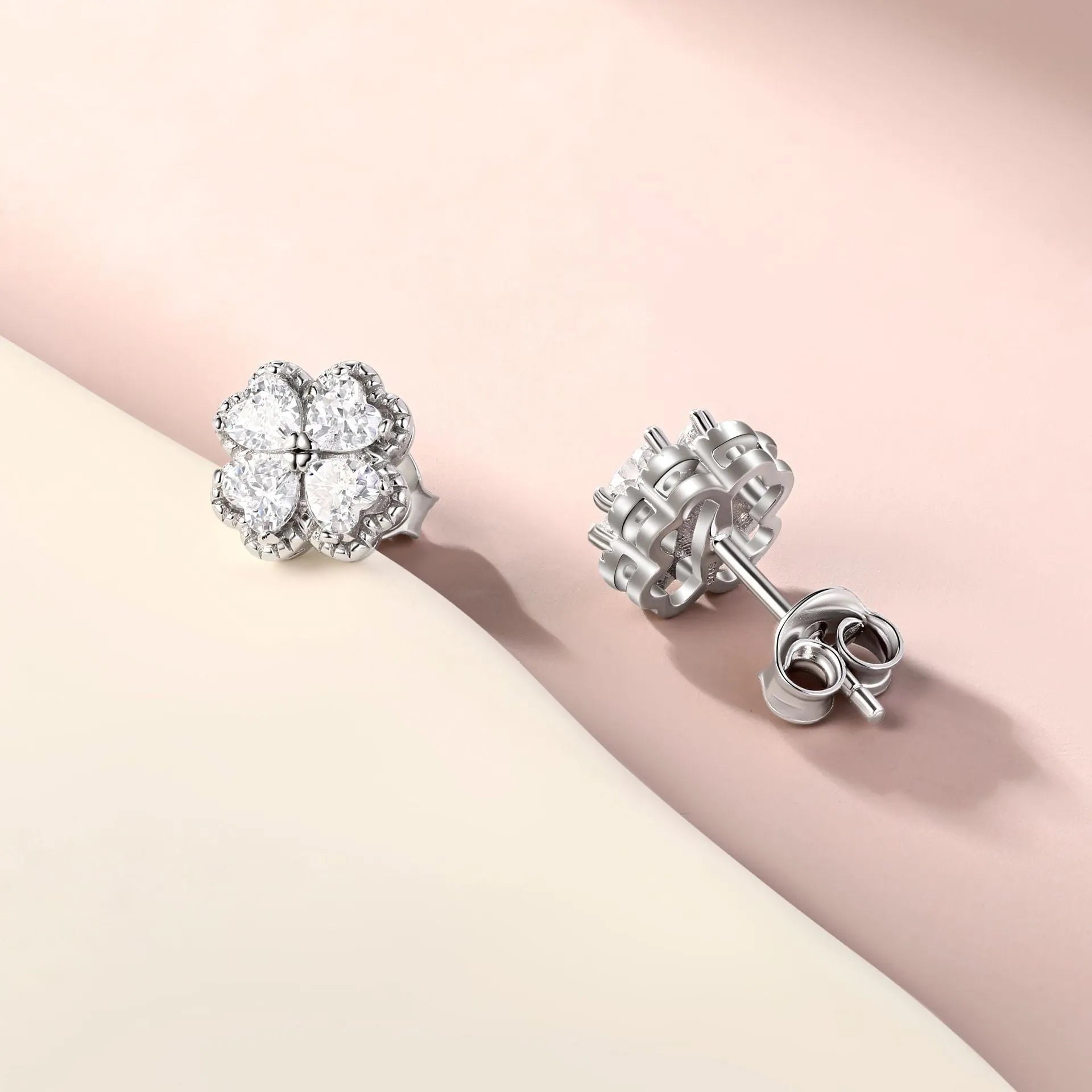 Women's sterling silver heart-shaped four-leaf clover earrings with white zircon stones