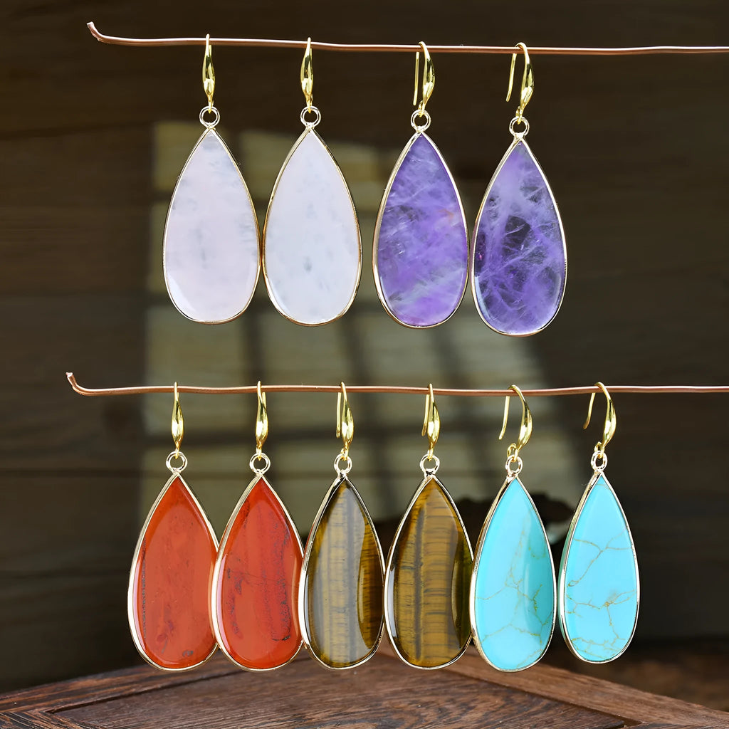 Vintage long water drop earrings in Tigereye stone, showing handmade retro design.