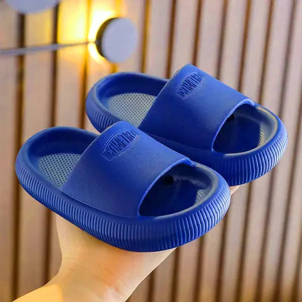 Brightly coloured children's EVA slippers with a textured non-slip sole, shown in multiple colour options.